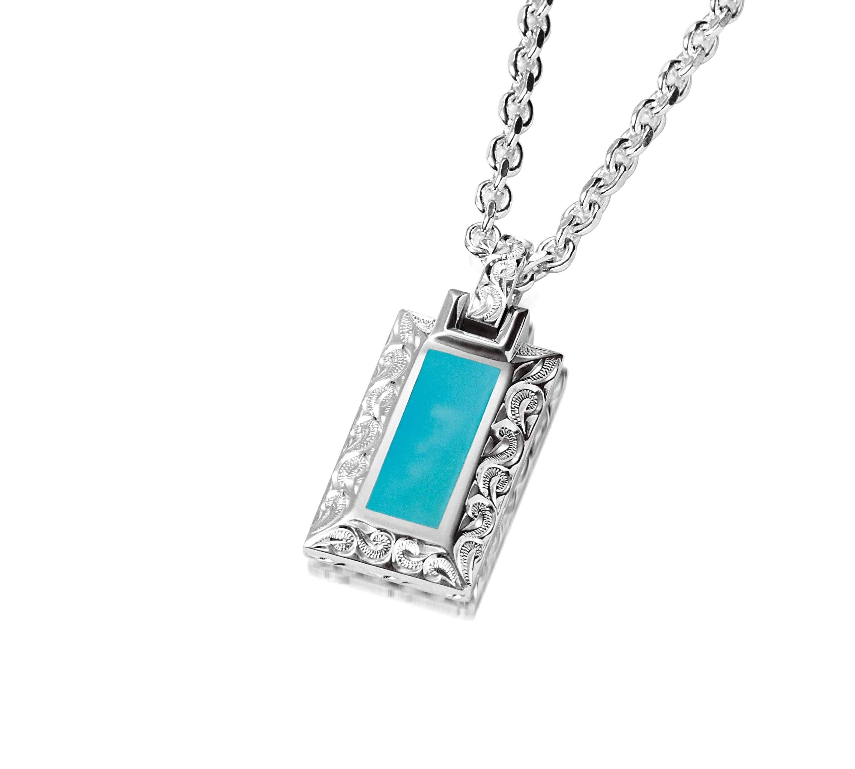 The photo shows a 925 sterling silver bar pendant with hand-engraved detailing and one large turquoise gemstone.