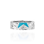 The picture shows a 925 sterling silver star matching ring with hand engravings and a turquoise gemstone.
