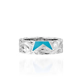 The picture shows a 925 sterling silver star matching ring with hand engravings and a turquoise gemstone.