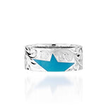 The picture shows a 925 sterling silver star matching ring with hand engravings and a turquoise gemstone.