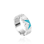 The picture shows a 925 sterling silver star matching ring with hand engravings and a turquoise gemstone.