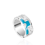 The picture shows a part of a set 925 sterling silver right half cross ring with hand-engravings, heart, and a turquoise gemstone.