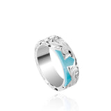 The picture shows a part of a set 925 sterling silver right half cross ring with hand-engravings and a turquoise gemstone.