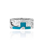 The picture shows a part of a set 925 sterling silver left half cross ring with hand-engravings, heart, and a turquoise gemstone.