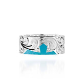 The picture shows a part of a set 925 sterling silver left half cross ring with hand-engravings and a turquoise gemstone.