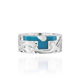 The picture shows a part of a set 925 sterling silver right half cross ring with hand-engravings, heart, and a turquoise gemstone.