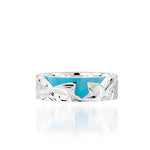 The picture shows a part of a set 925 sterling silver right half cross ring with hand-engravings and a turquoise gemstone.