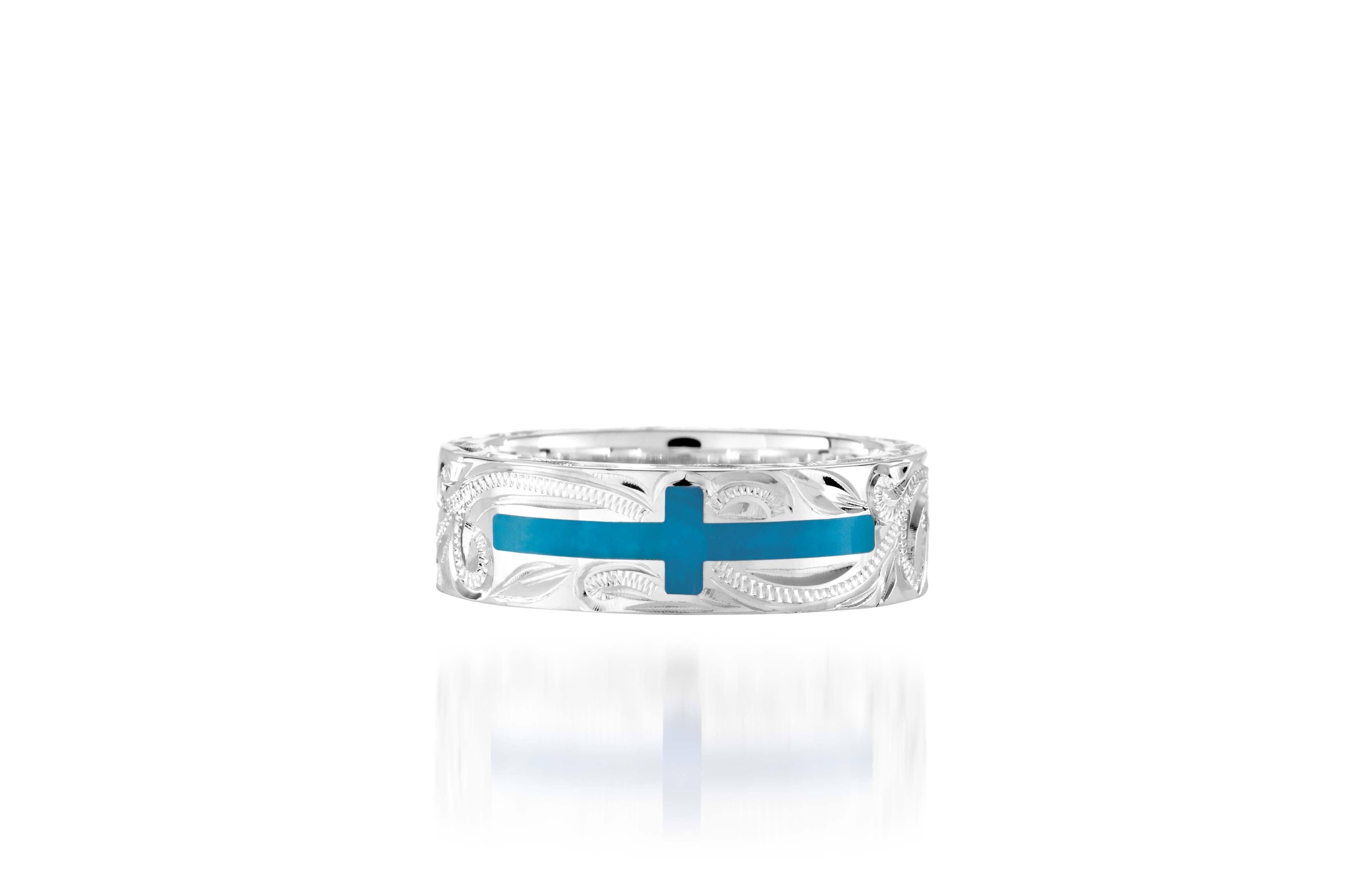 The picture shows a 925 sterling silver and turquoise cross ring with hand engravings.