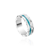 The picture shows a 925 sterling silver and turquoise wave channel ring with hand engravings.