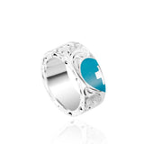 The picture shows a 925 sterling silver and turquoise heart with a cross matching ring with hand engravings.