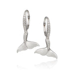 The picture shows a pair of 925 sterling silver whale tail earrings with topaz.