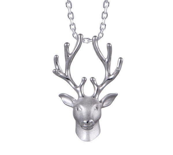In this photo there is a sterling silver reindeer head pendant.